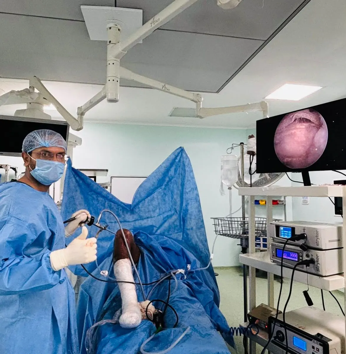 Dr. Balagangadhara with an arthroscope and the view on a monitor